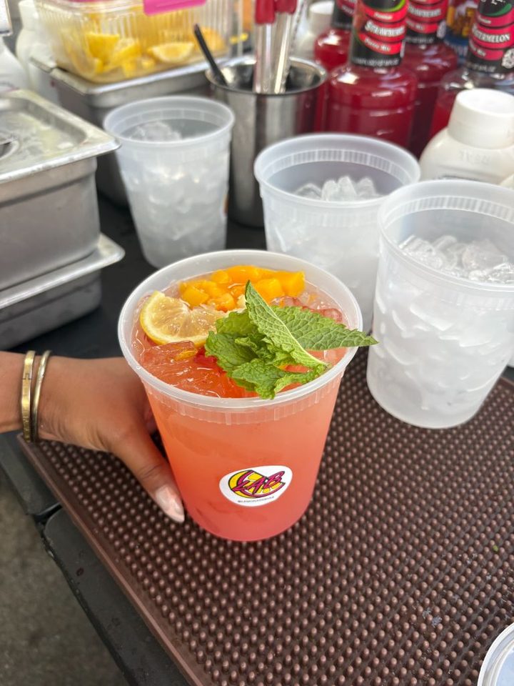 Mango strawberry lemonade topped with mint